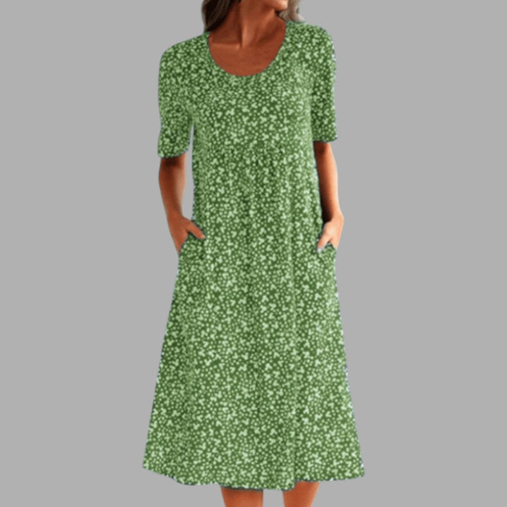 Flowy chic printed midi dress, perfect for women seeking elegant and sophisticated daytime or party wear.