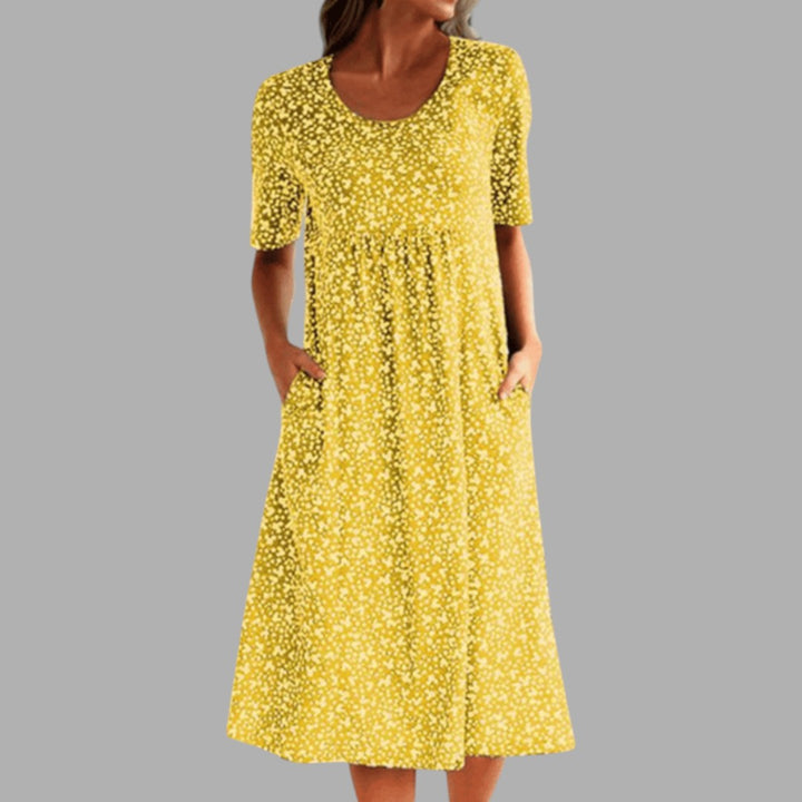 Stylish women's printed midi dress in a flattering length. Embrace spring and summer fashion with this elegant piece.