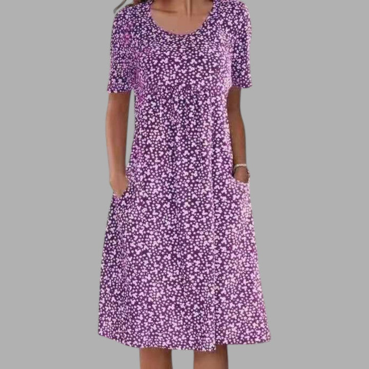 Sophisticated women's printed midi dress, combining comfort with chic elegance for a versatile wardrobe addition.