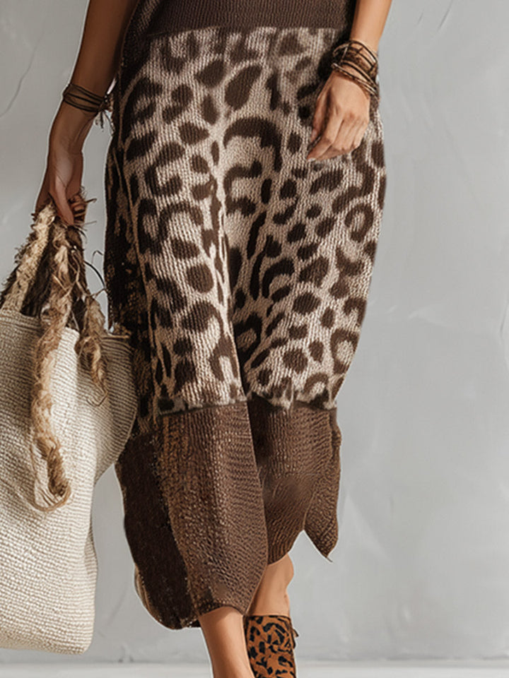 Trendy leopard print midi dress for women. Chic sleeveless design offers comfortable, effortless elegance for versatile wear.