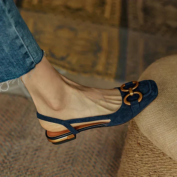 Elegant women's slingback flats featuring ergonomic comfort & stylish gold accent, perfect for casual or dressy looks.