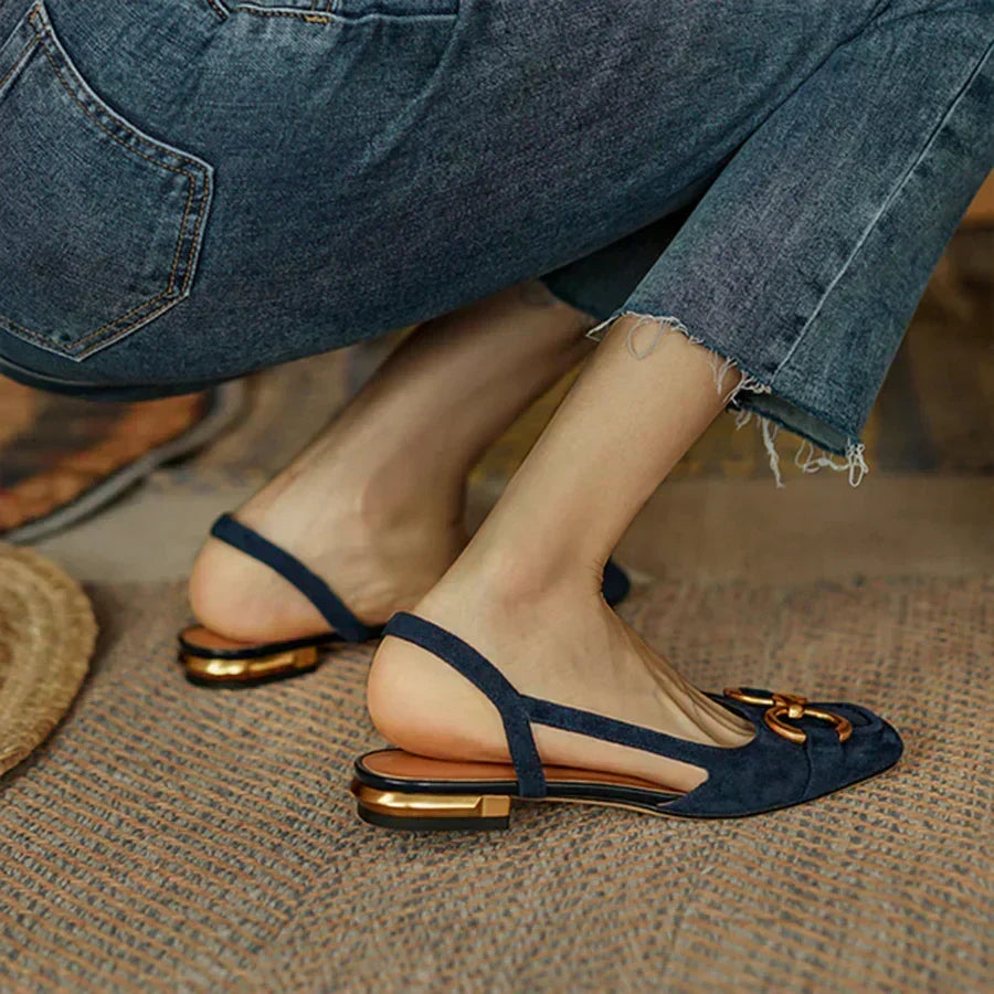 Comfortable women's ergonomic slingback flats with elegant gold detail, ideal for all-day walking and versatile style.