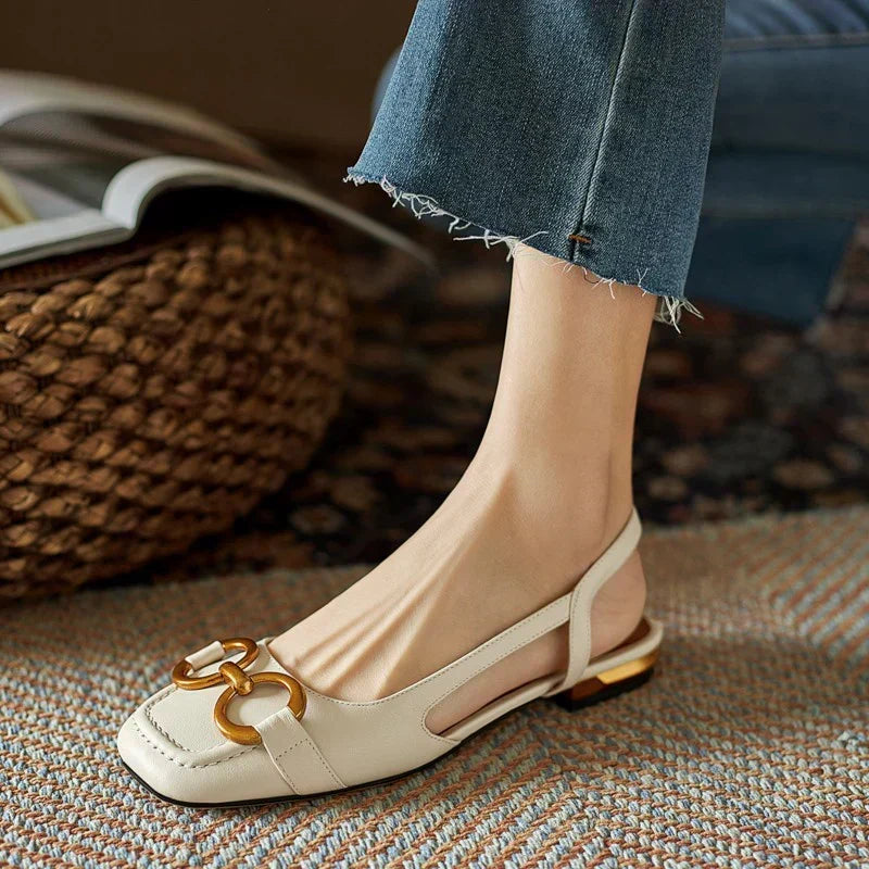 Stylish women's ballet-style slingback flats. Ergonomic slip-on design with chic gold detail for comfort & versatility.