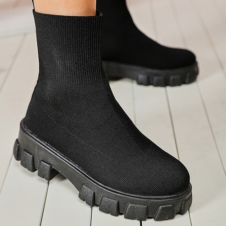 Modern women's slip-on ankle boots, offering chic style, comfort, and versatile fashion.