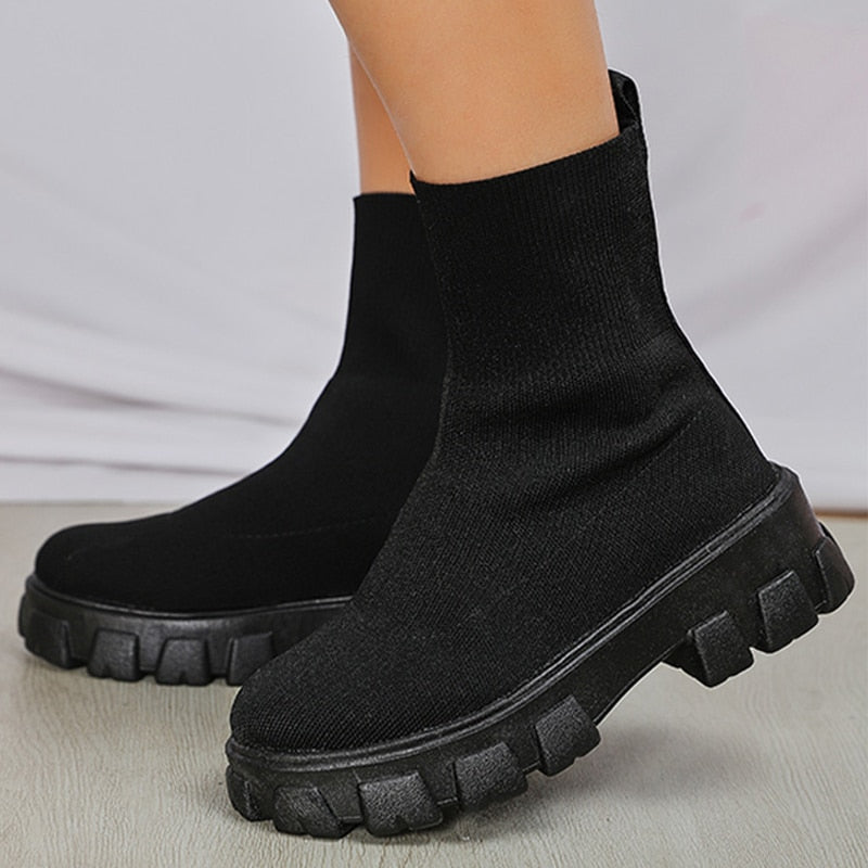 Fashionable women's slip-on ankle boots for easy wear, combining style with comfort.