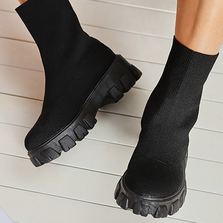 Versatile women's slip-on ankle booties, an essential for chic fall fashion and daily comfort.