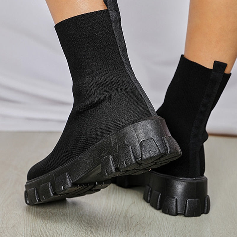 Women's stylish slip-on ankle boots, perfect elegant footwear for effortless everyday fashion.