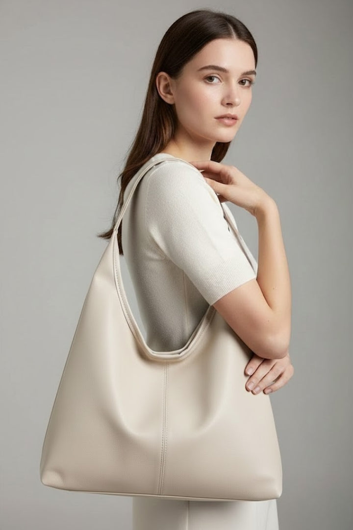 Modern women's handbag, a spacious and organized tote. Perfect for work or leisure, a truly versatile carryall.