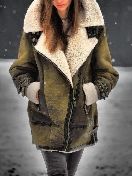 Chic women's suede sherpa jacket in a warm, elegant style. Perfect cozy outerwear for fall and winter fashion.