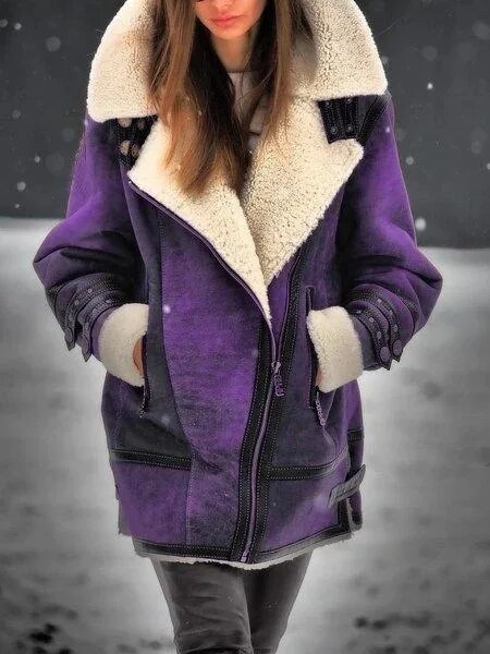 Modern women's long sleeve suede sherpa jacket. Elegant, cozy outer layer for stylish fall and winter fashion.