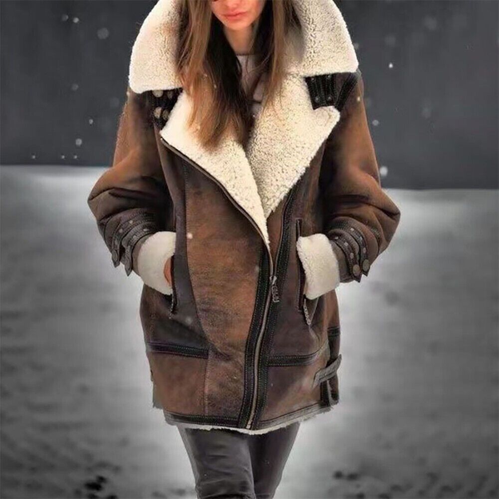 Mila women's elegant suede sherpa jacket. A chic & cozy outerwear piece, perfect for modern fall and winter style.