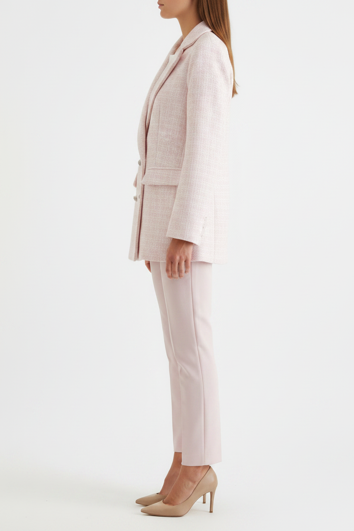 Versatile women's pink blazer, a stylish tailored jacket for office, business casual, or chic spring fashion.