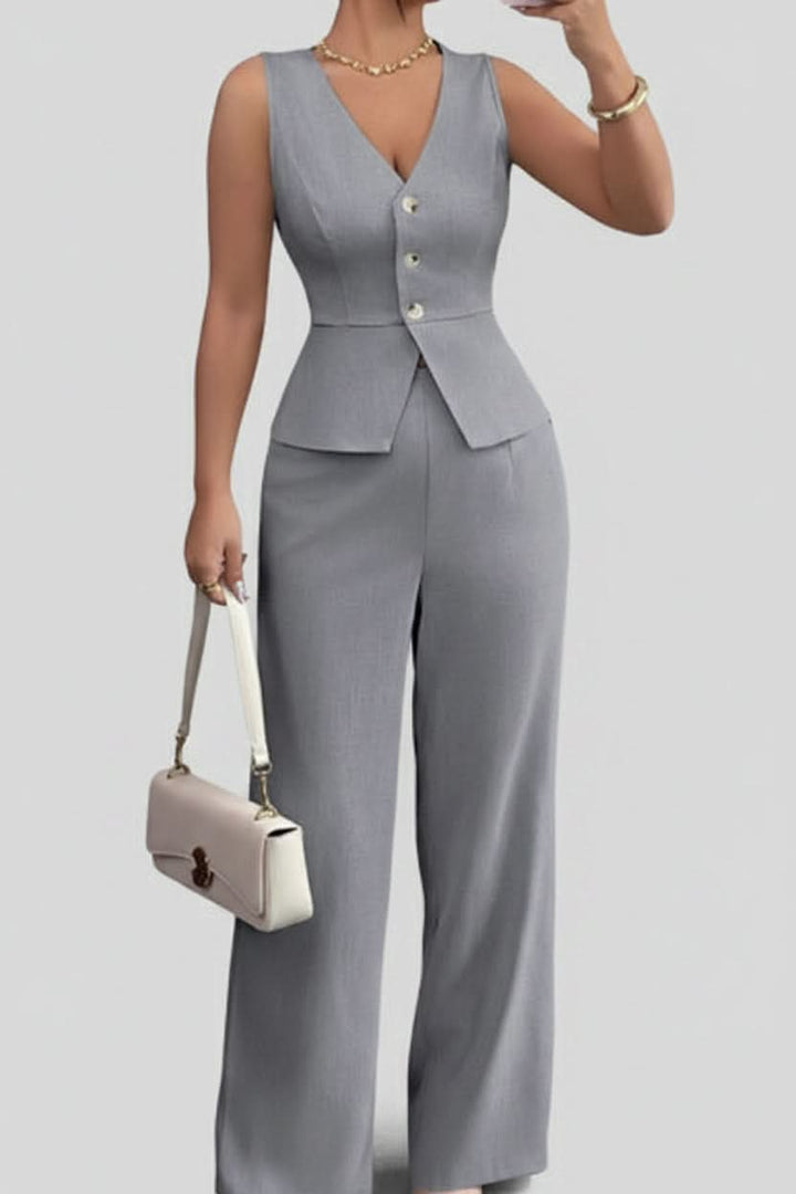 Professional women's trouser set with a chic waistcoat & wide-leg pants, ideal for smart elegant occasions.