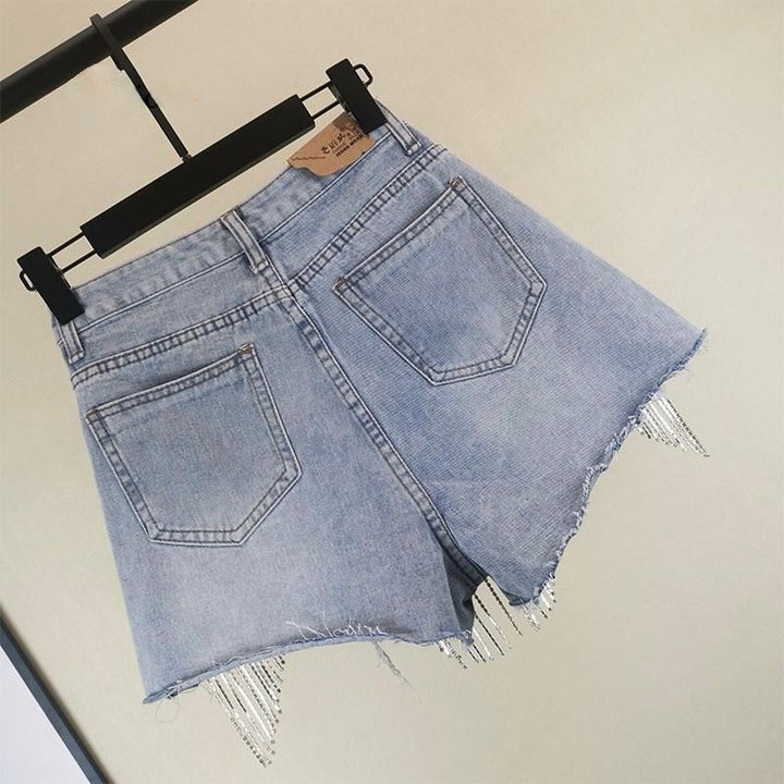 Women's versatile shorts featuring chic tassels. Perfect casual summer fashion bottom, stylish for vacation.