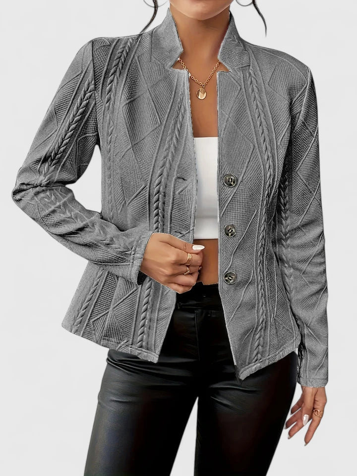 Versatile women's textured stand-collar blazer, a chic and modern tailored jacket for any professional setting.