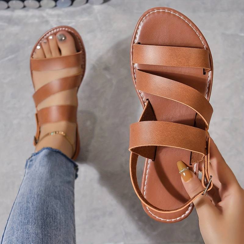 Versatile women's three-strap flat sandals, perfect casual summer shoes for comfortable everyday wear & beach outings.