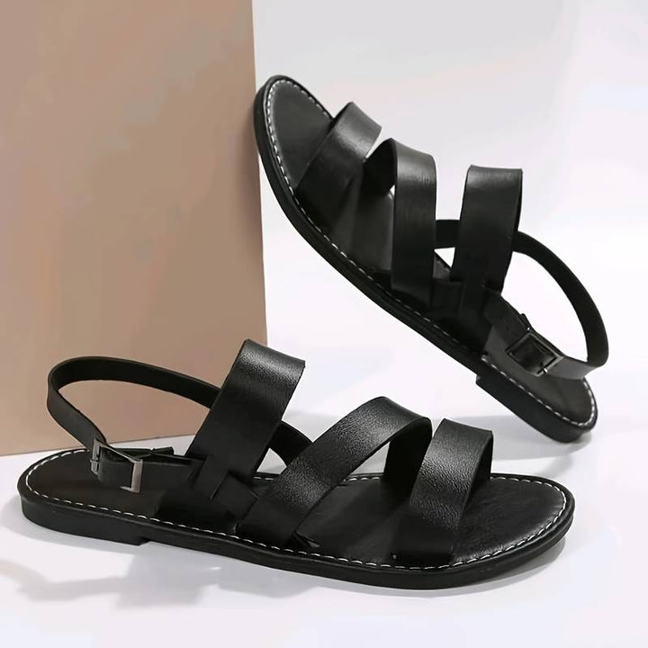 Chic women's open-toe three-strap flat sandals, offering comfortable and stylish casual footwear for summer.