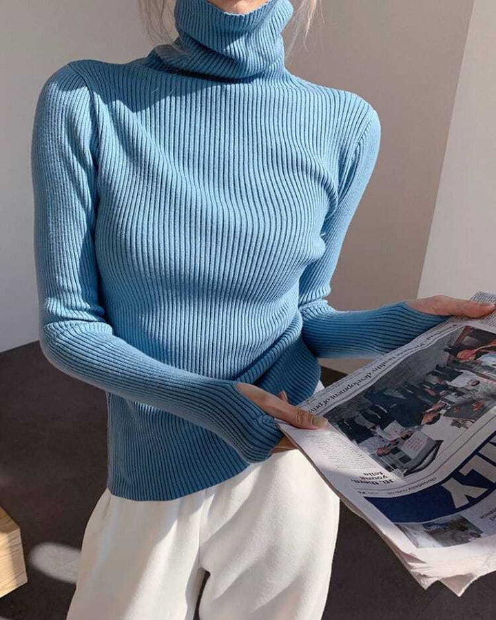 Classic women's long sleeve turtleneck sweater, a timeless knit pullover for chic winter style.