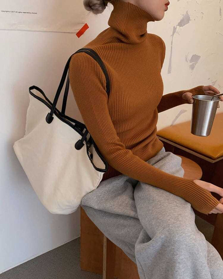Soft-touch women's turtleneck sweater, a cozy knit pullover top for chilly fall & winter days.