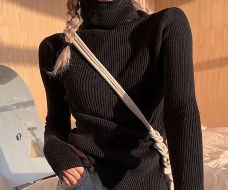 Soft knit women's turtleneck sweater, an elegant long sleeve pullover top for winter fashion.