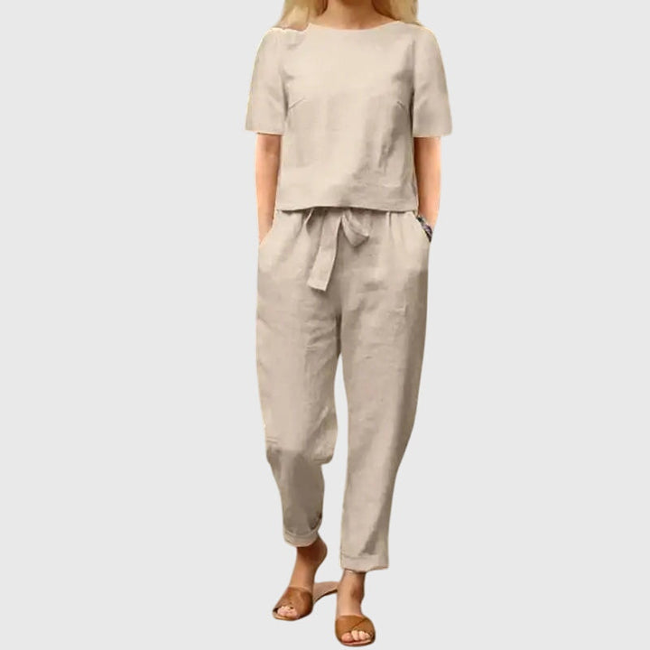 Stylish women's crop top and belted trousers set. An effortless two-piece outfit, great for day to night wear.