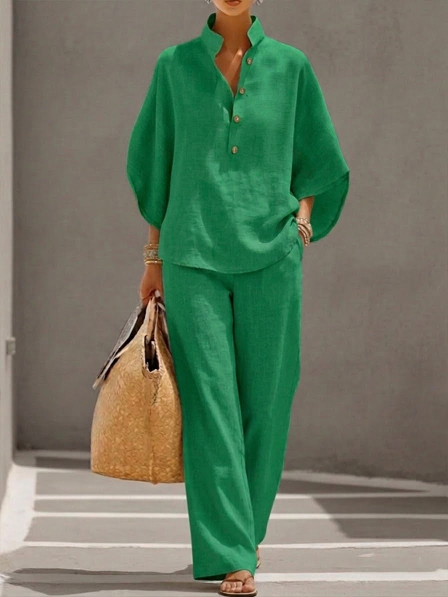 Women's stylish batwing sleeve blouse and wide leg trousers matching set for effortless everyday wear.