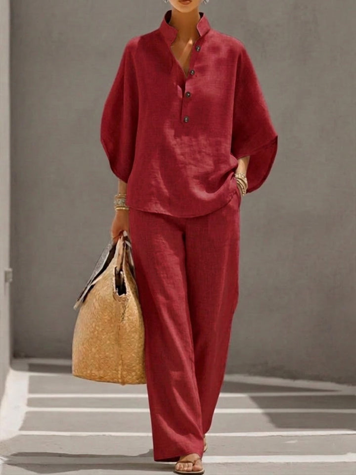 Fashionable women's coordinating set: batwing top & wide leg pants. Chic style for modern women.