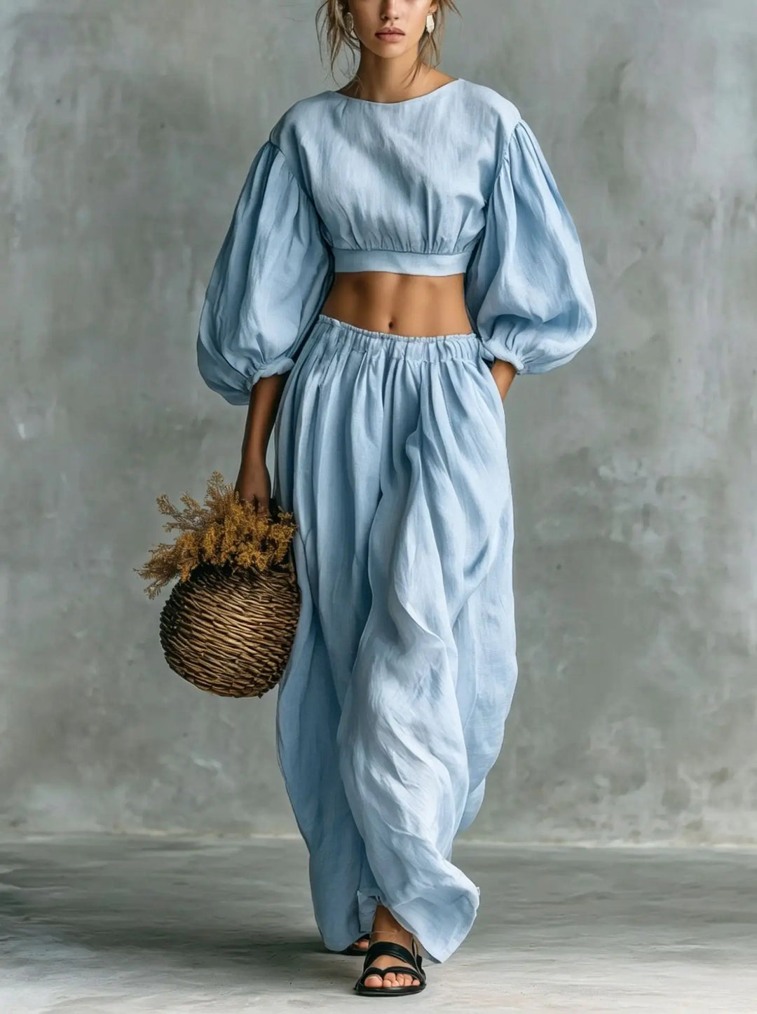 Chic women's two-piece trouser set with balloon sleeves & wide leg pants, perfect for casual wear or vacation. Relaxed fit.