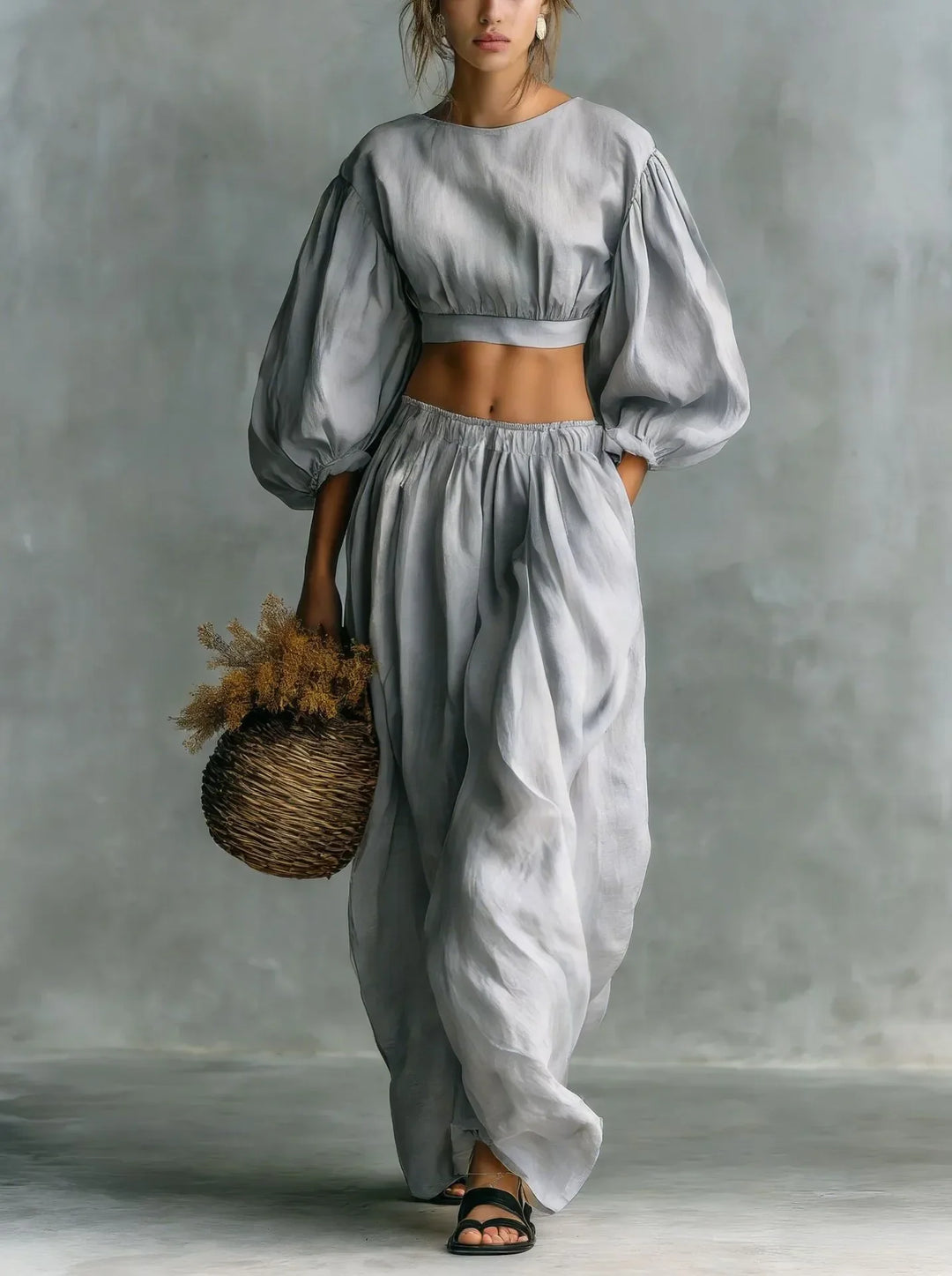 Elegant women's balloon sleeve two-piece set, featuring a cropped top & wide-leg trousers. Ideal for vacation/casual.