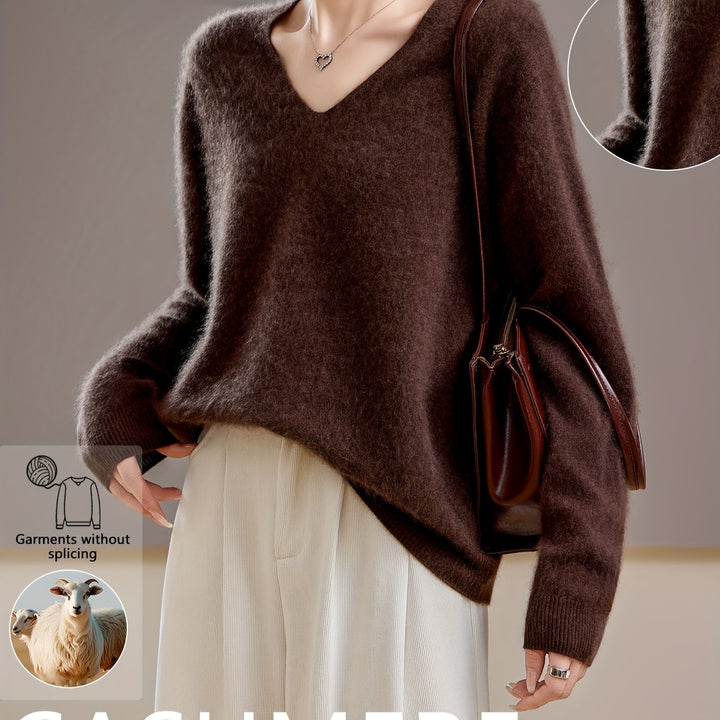 Women's V-neck sweater, soft cozy knitwear, long sleeve and relaxed fit. Essential for versatile autumn fashion.