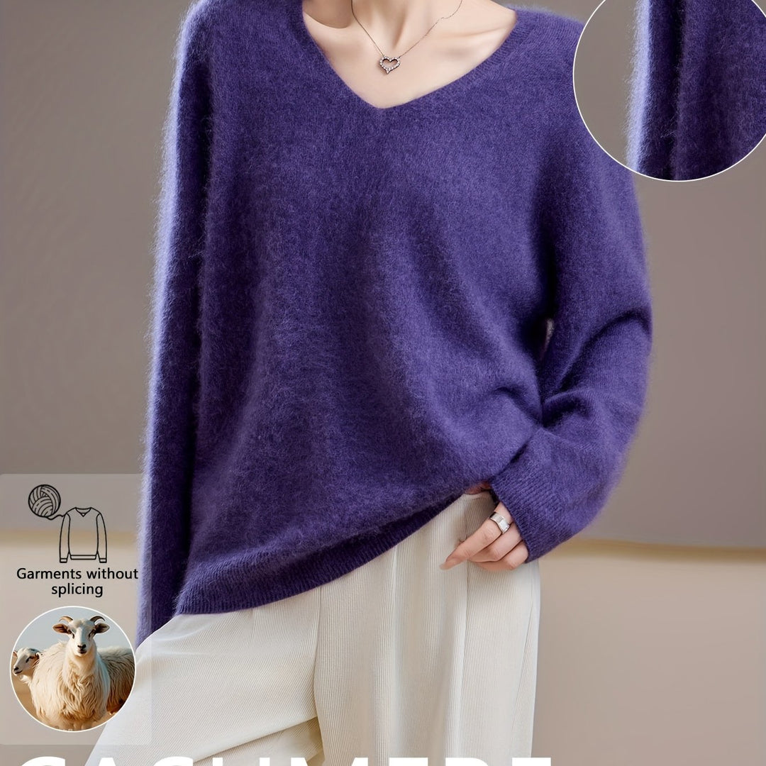 Comfortable women's V-neck sweater, a chic oversized knitwear piece for elegant autumn layering and cold weather.