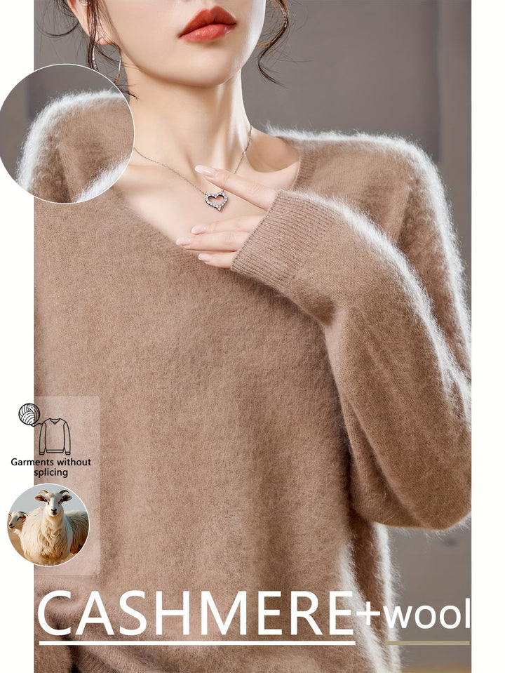 Cozy V-neck sweater for women, featuring a relaxed fit & long sleeves. An essential wardrobe staple for autumn.