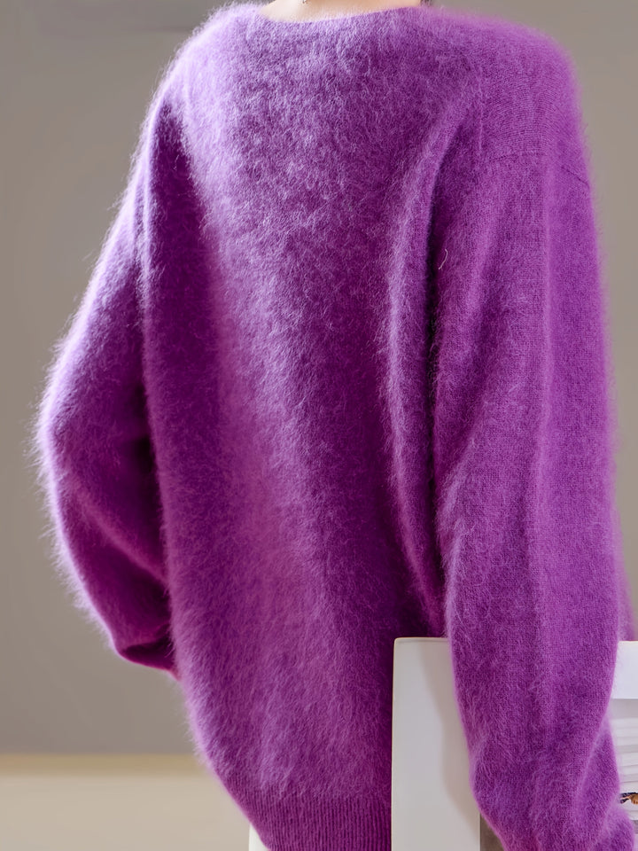 Soft & cozy knit V-neck sweater for women. Comfortable long sleeve top, ideal for cold weather autumn style.