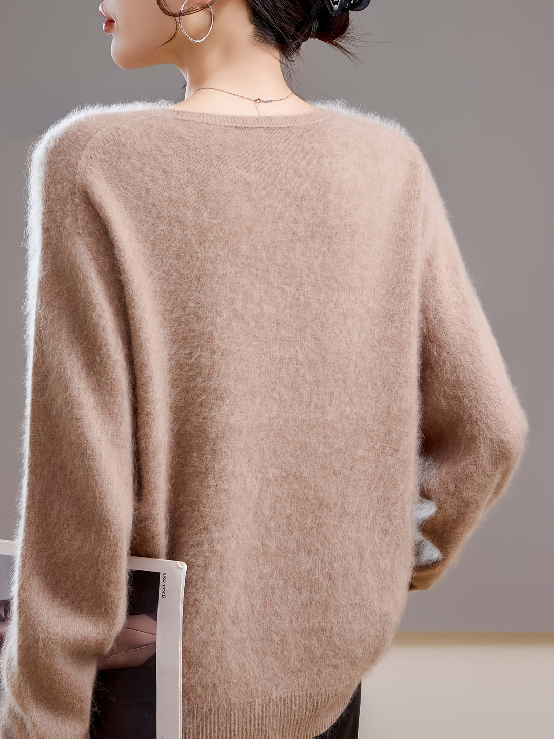 Ultra-cozy women's V-neck sweater, a comfortable long sleeve layering piece for relaxed autumn style.