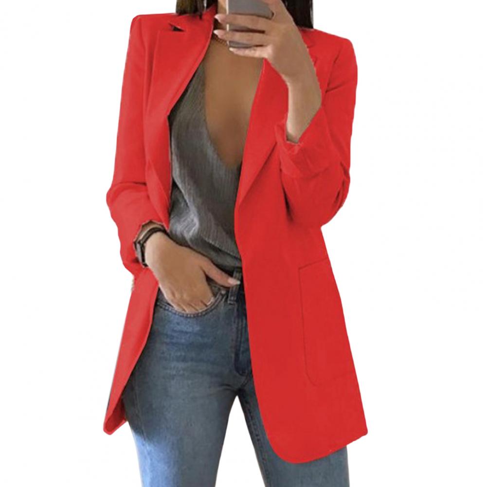 Elegant women's blazer with functional pockets, suitable for chic office or casual womenswear.