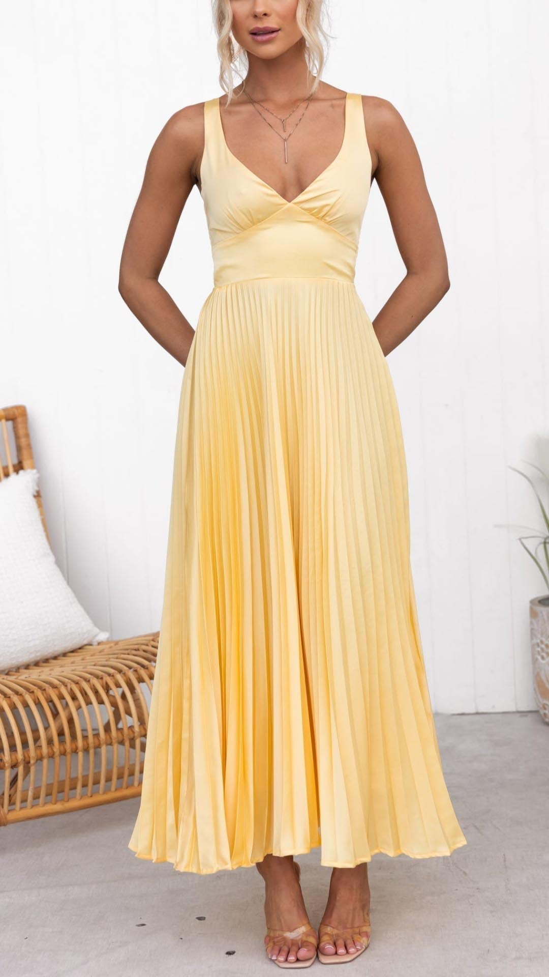 Women's elegant V-neck pleated midi wedding guest dress. Perfect A-line summer party occasion wear.