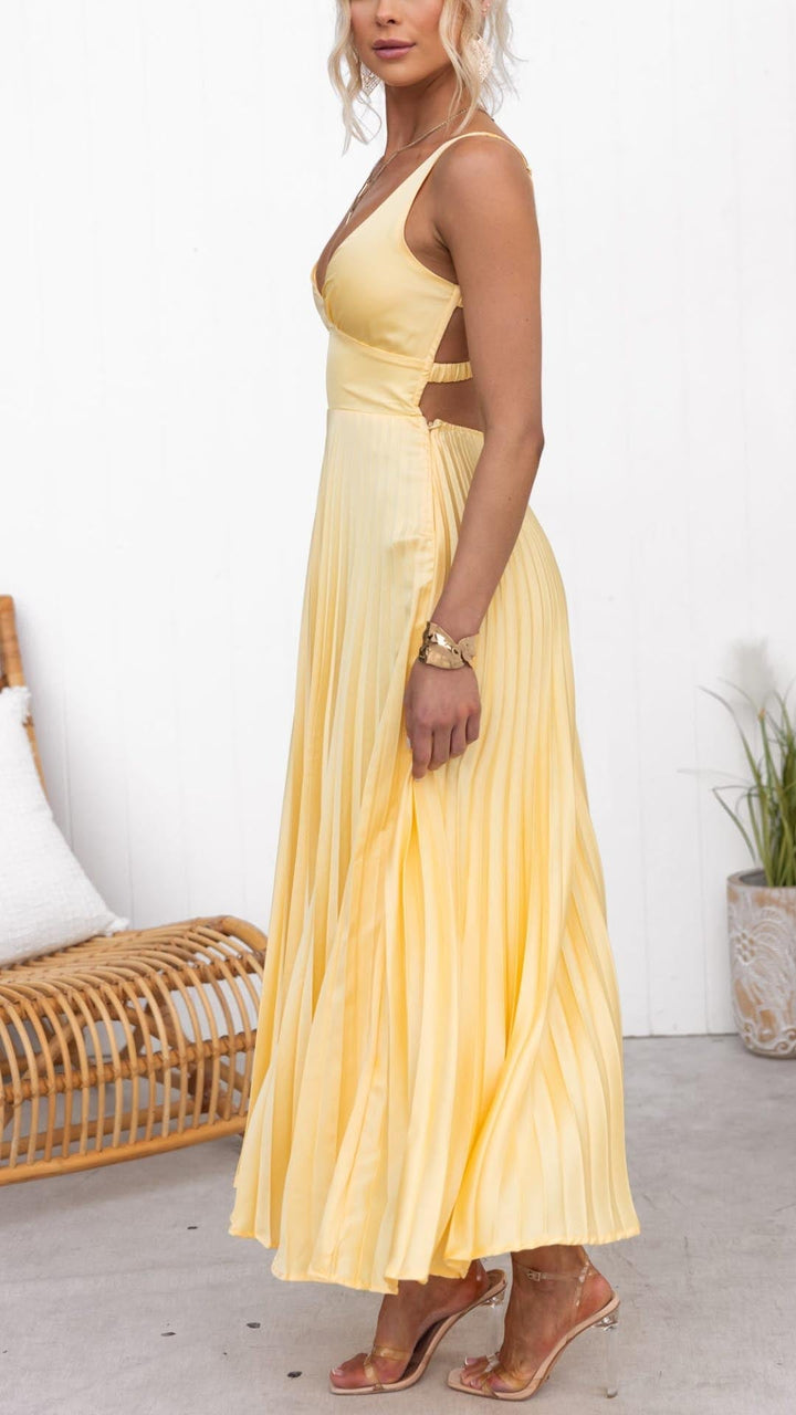 Beautiful A-line pleated V-neck midi dress, ideal as a yellow wedding guest or chic summer party dress for women.