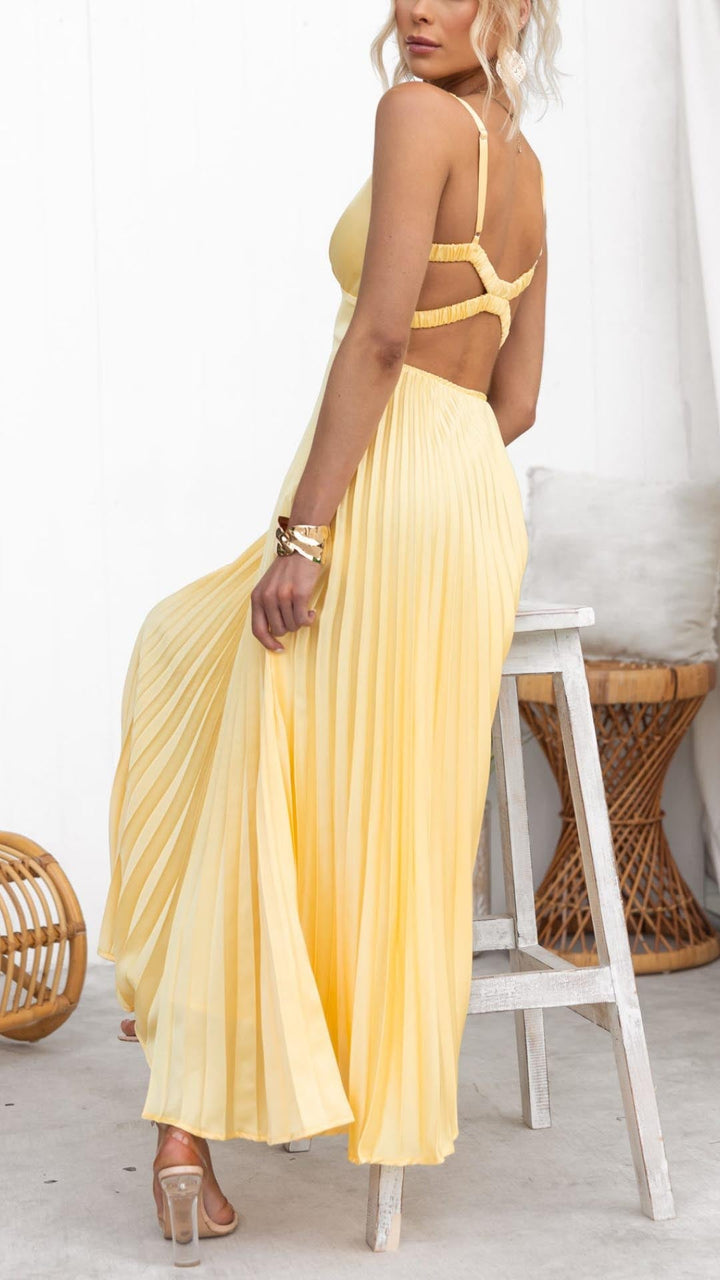 Elegant yellow V-neck pleated midi dress for women. Chic summer A-line wedding guest or party occasion wear.