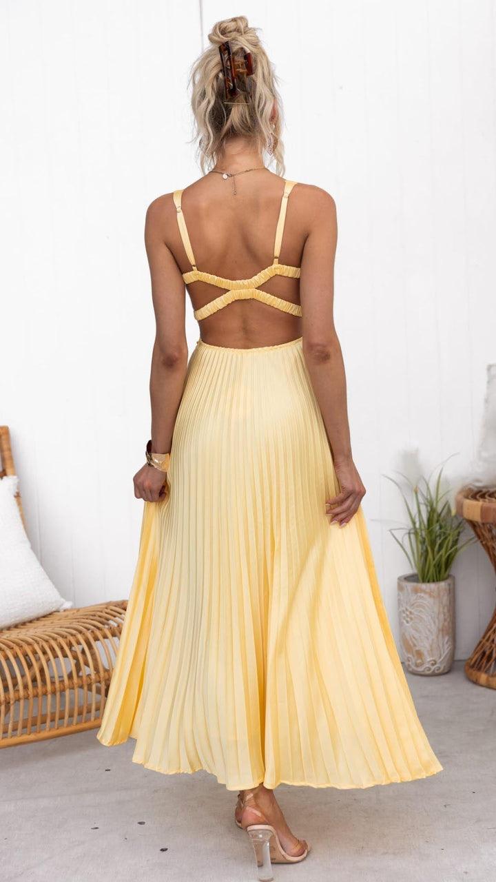 Stylish women's yellow midi dress featuring a V-neck and pleats. Chic A-line design, perfect for wedding guests.