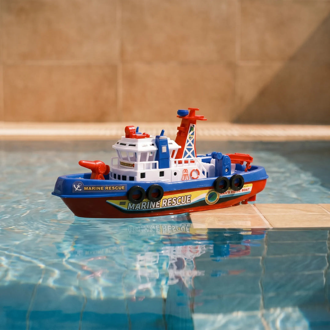 Kids' motorized fireboat bath toy, sprays water for fun play in tubs & pools.