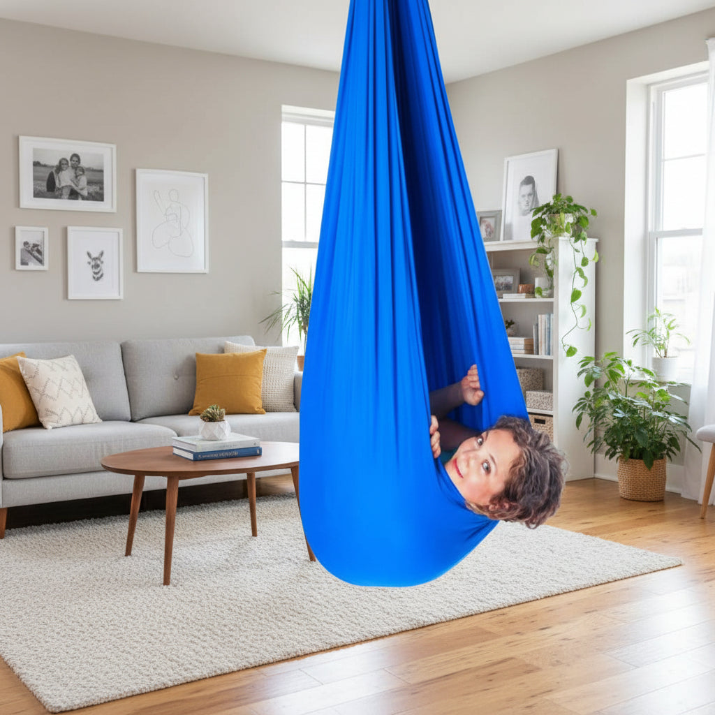 Soft, comfortable indoor sensory swing helps children with focus, calm, & sensory regulation.