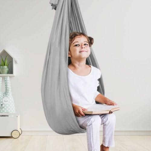 Occupational therapy swing, a calming indoor solution for kids with special needs & sensory regulation.
