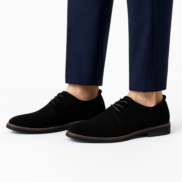 Close-up of elegant men's leather Derby shoes with classic lace-up design, ideal for formal & smart wear.