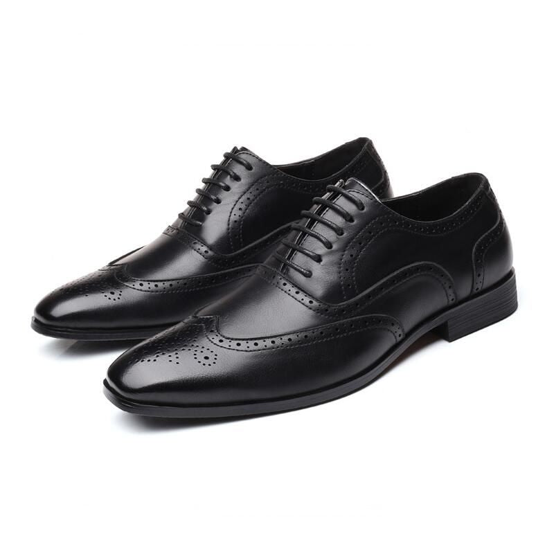 Elegant classic men's Oxford brogue dress shoes, a timeless addition to any wardrobe.