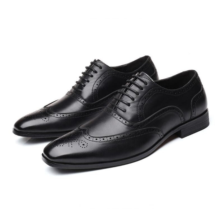 Elegant classic men's Oxford brogue dress shoes, a timeless addition to any wardrobe.