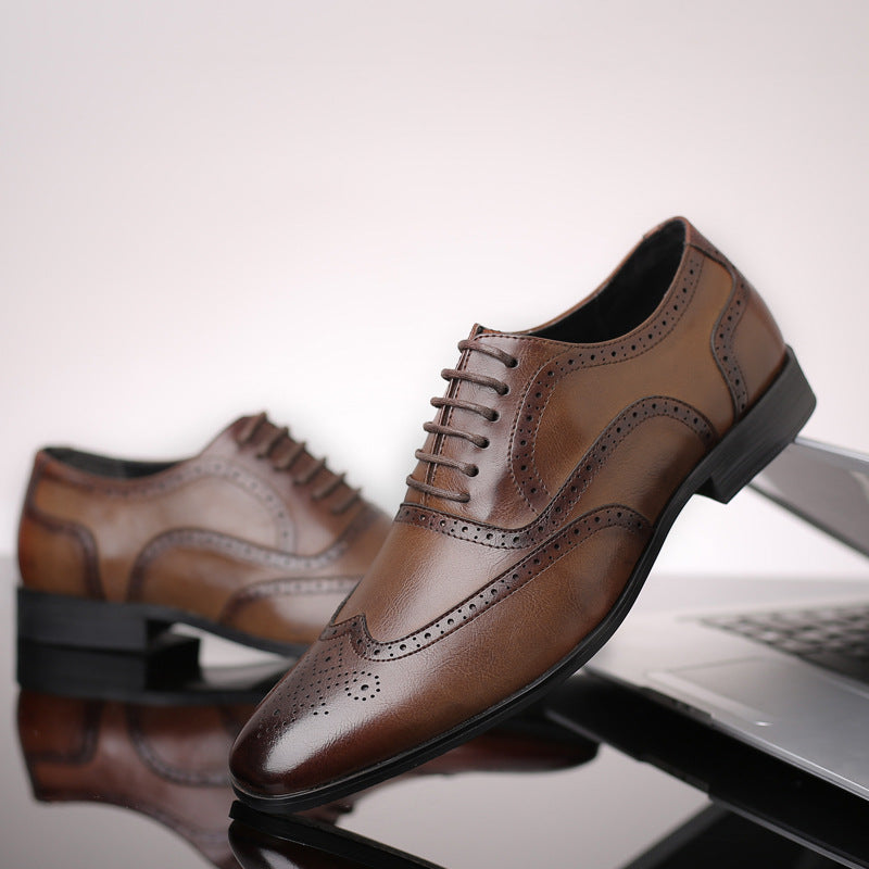Classic black formal Oxford brogue shoes, an essential for any man's professional wardrobe.