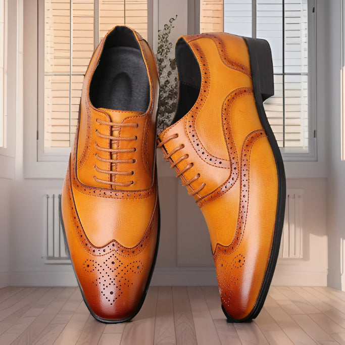 Traditional dark brown Oxford brogue dress shoes, ideal for classic men's fashion.