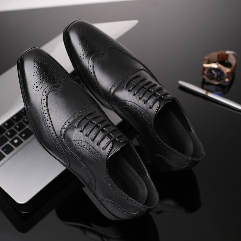Detailed close-up of men's genuine leather Oxford brogue dress shoes with intricate perforations.