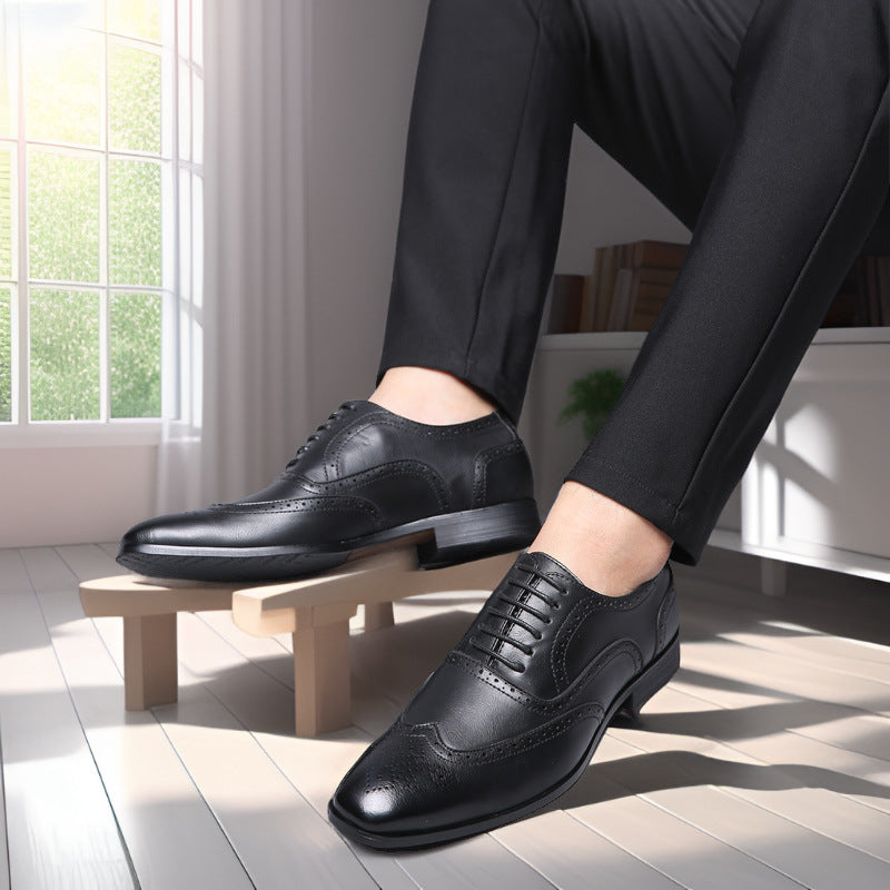 Front view of classic black Oxford brogue dress shoes, showcasing elegant design.