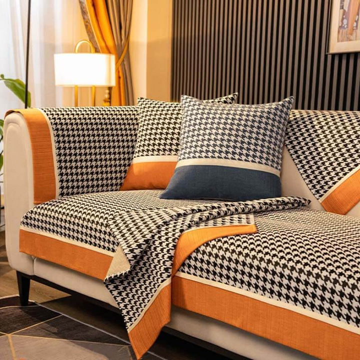 Classic houndstooth chenille non-slip sofa cover for modern living room decor, pet friendly protection.